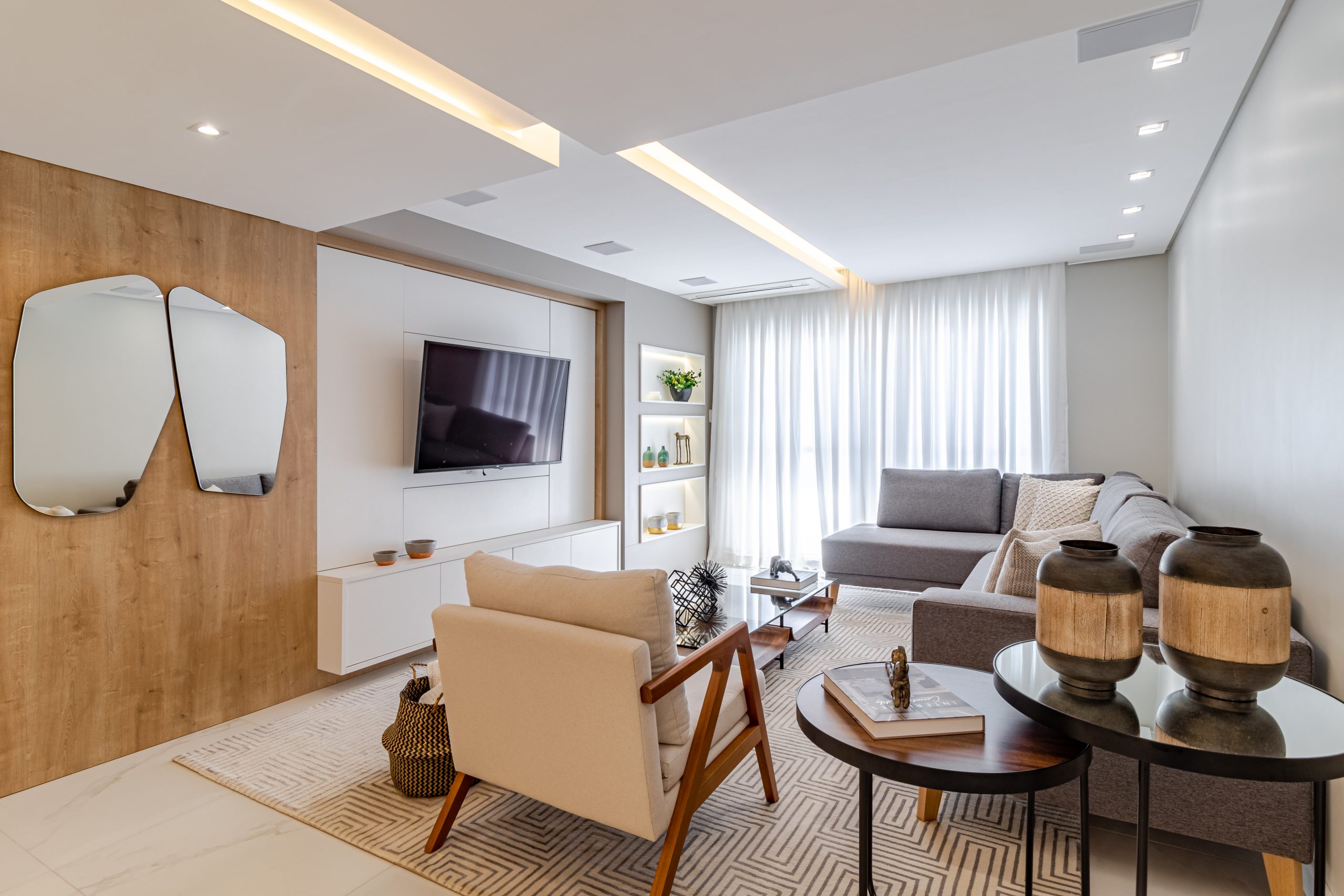 sala de estar com decoração com espalho ambiente integrado living